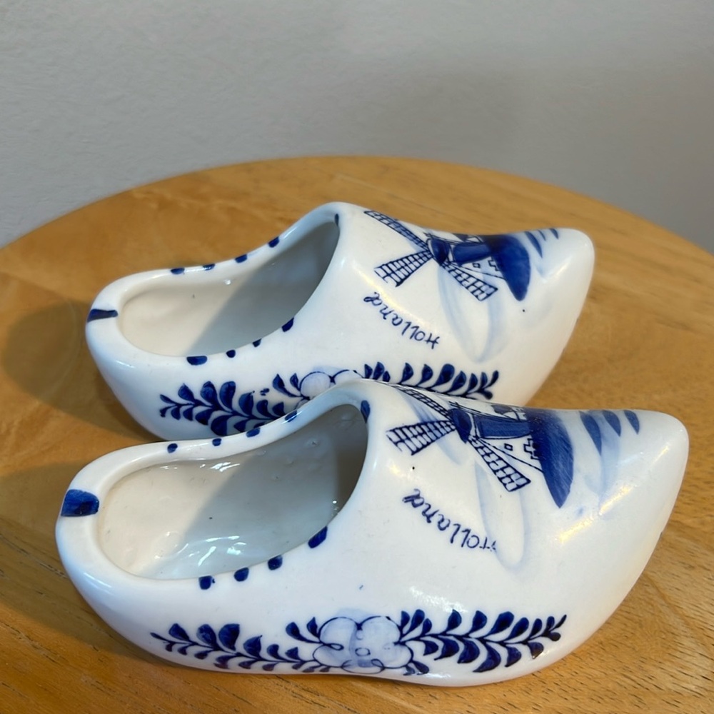 A pair of Holland miniature blue and white clog shoes